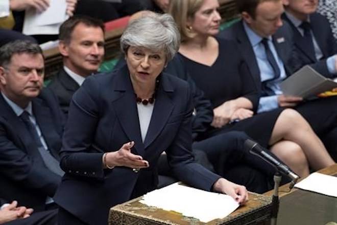 Britain’s Prime Minister Theresa May stands to talk to lawmakers inside the House of Commons parliament in London Wednesday March 27, 2019. (Jessica Taylor/House of Commons via AP)