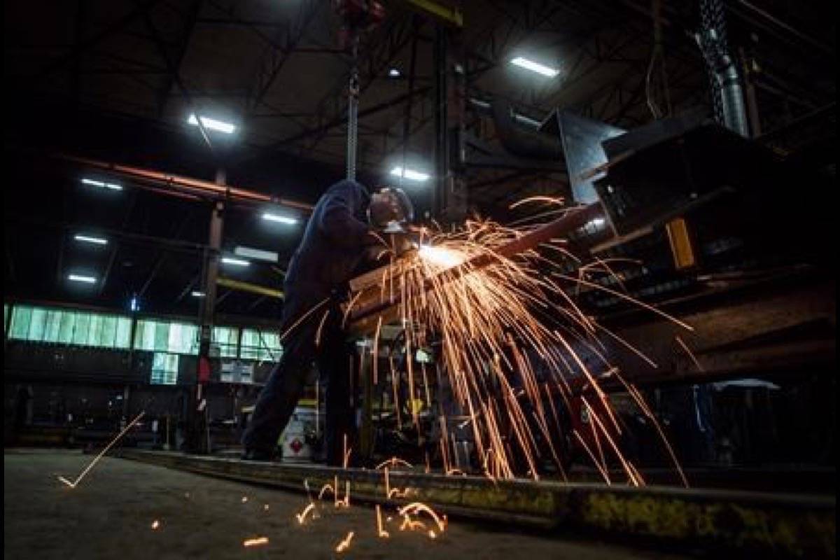 Fabricator Mike Caldarino uses a grinder on a steel stairs being manufactured for a high school in Redmond, Wash., at George Third & Son Steel Fabricators and Erectors, in Burnaby, B.C., on March 29, 2018. Statistics Canada says real gross domestic product grew 0.3 per cent in in January, topping expectations. The agency says the growth offset declines in November and December 2018. THE CANADIAN PRESS/Darryl Dyck